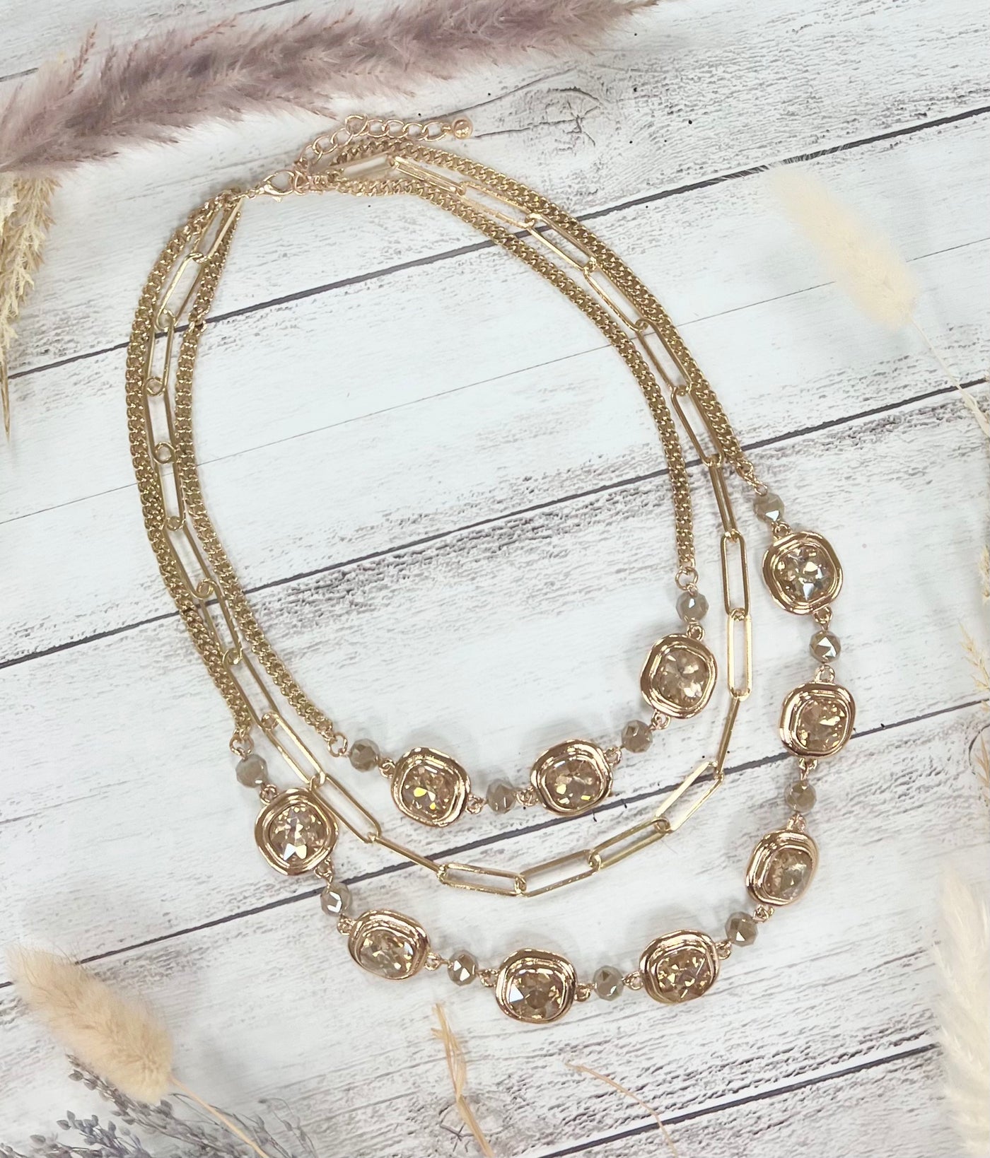 Gleaming Gold Symphony: Chunky Layers & Crystal Sparks Necklace