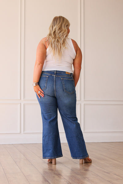 The Blake Mid Washed Mid Rise Distressed Crop Flare