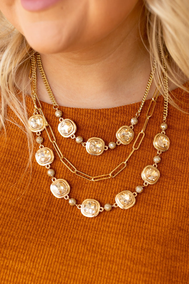 Gleaming Gold Symphony: Chunky Layers & Crystal Sparks Necklace