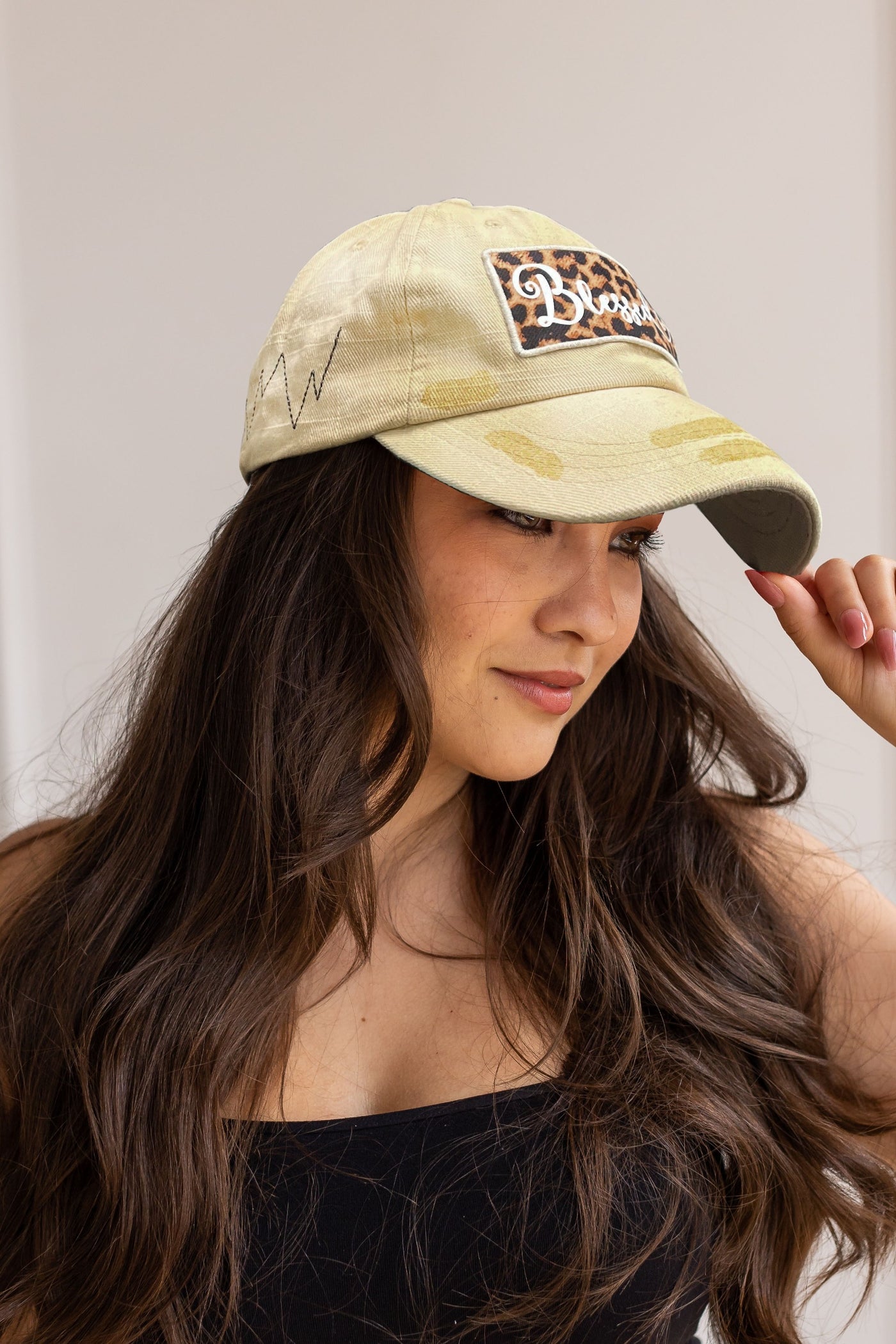 White Blessed Leopard Patch on Beige Hat with Glitter Accents