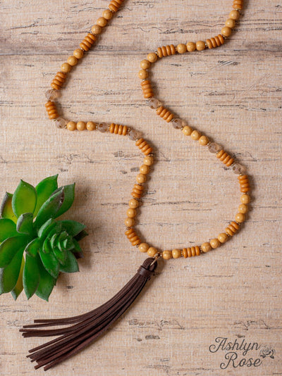 JUST A SMALL TOWN GAL LEATHER TASSEL WOOD BEADED NECKLACE