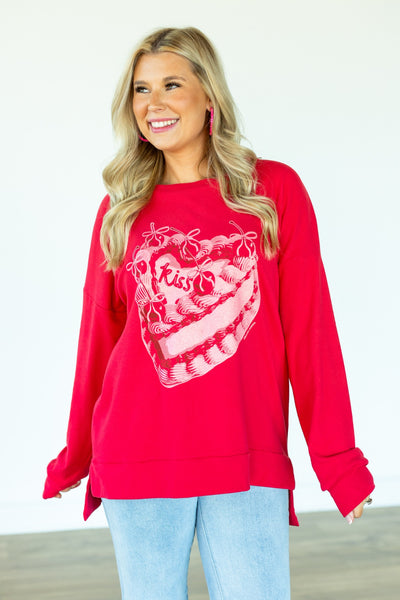 Kiss Cake on Red Sweatshirt