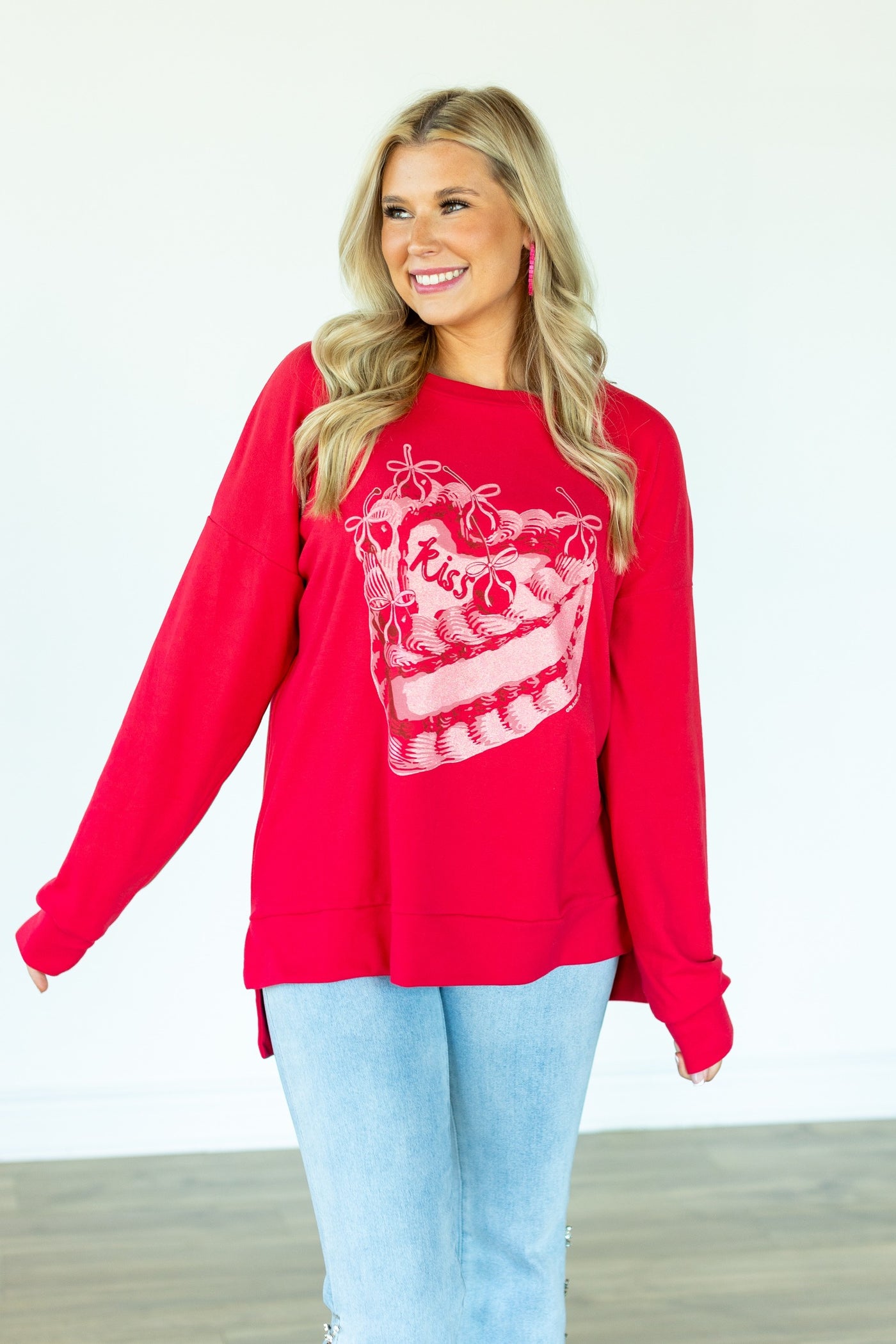 Kiss Cake on Red Sweatshirt