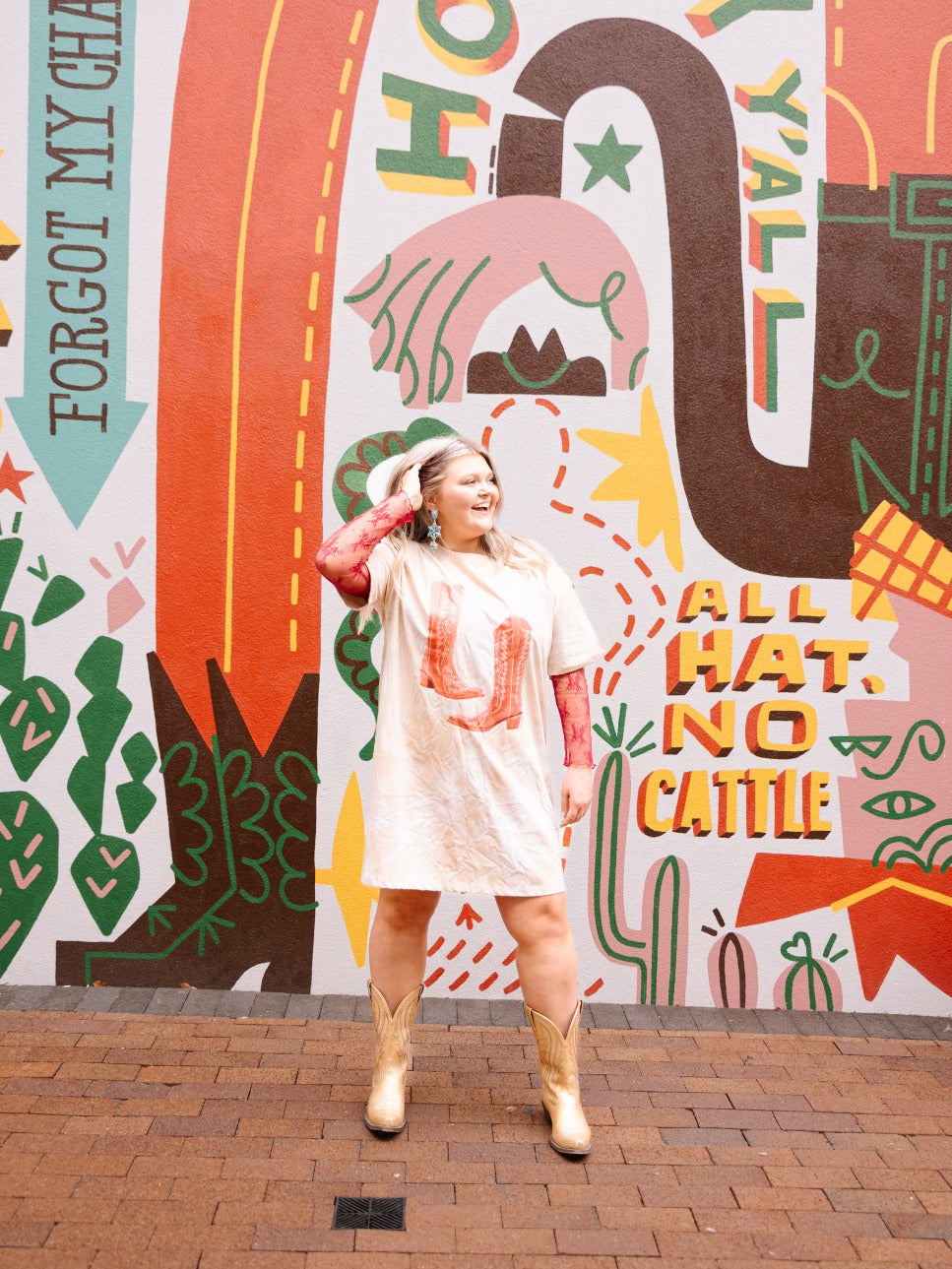 Red Cowgirl Boots on Beige Tie Dye T-Shirt Dress