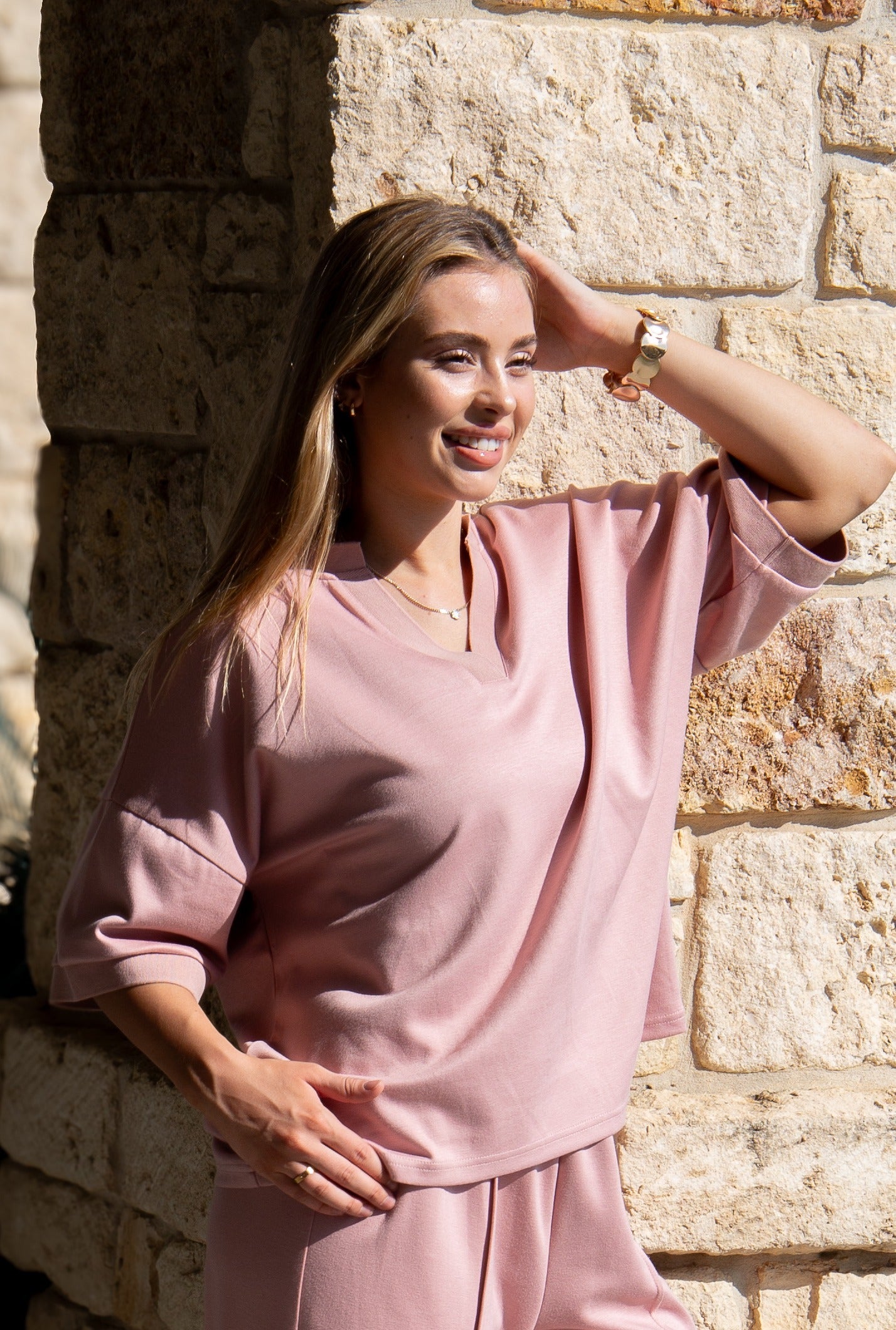 Butter Soft V-Neck Top styled on model, an example of fitted tops for women