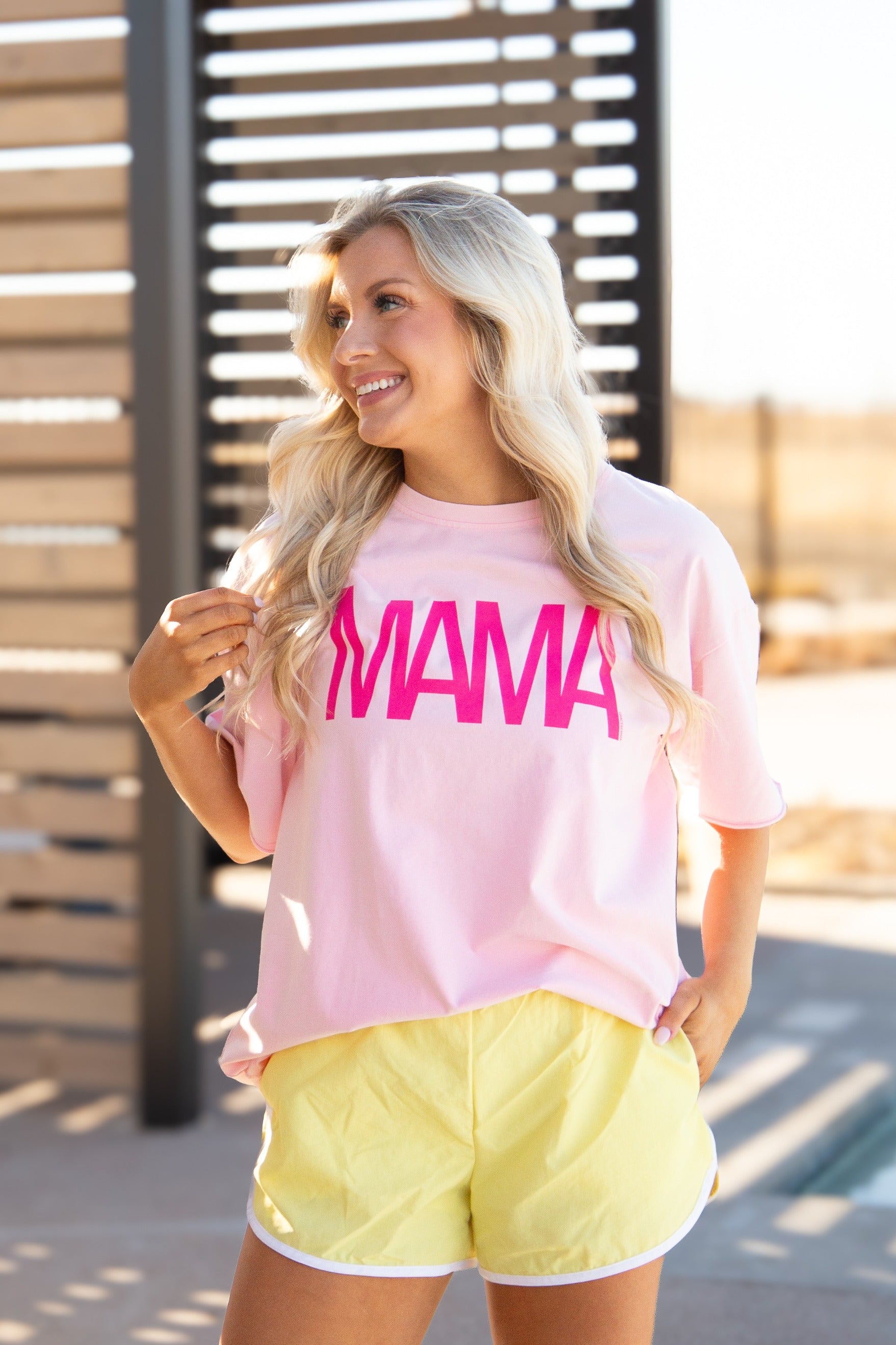 Close up of the MAMA graphic on the pink relaxed fit tee