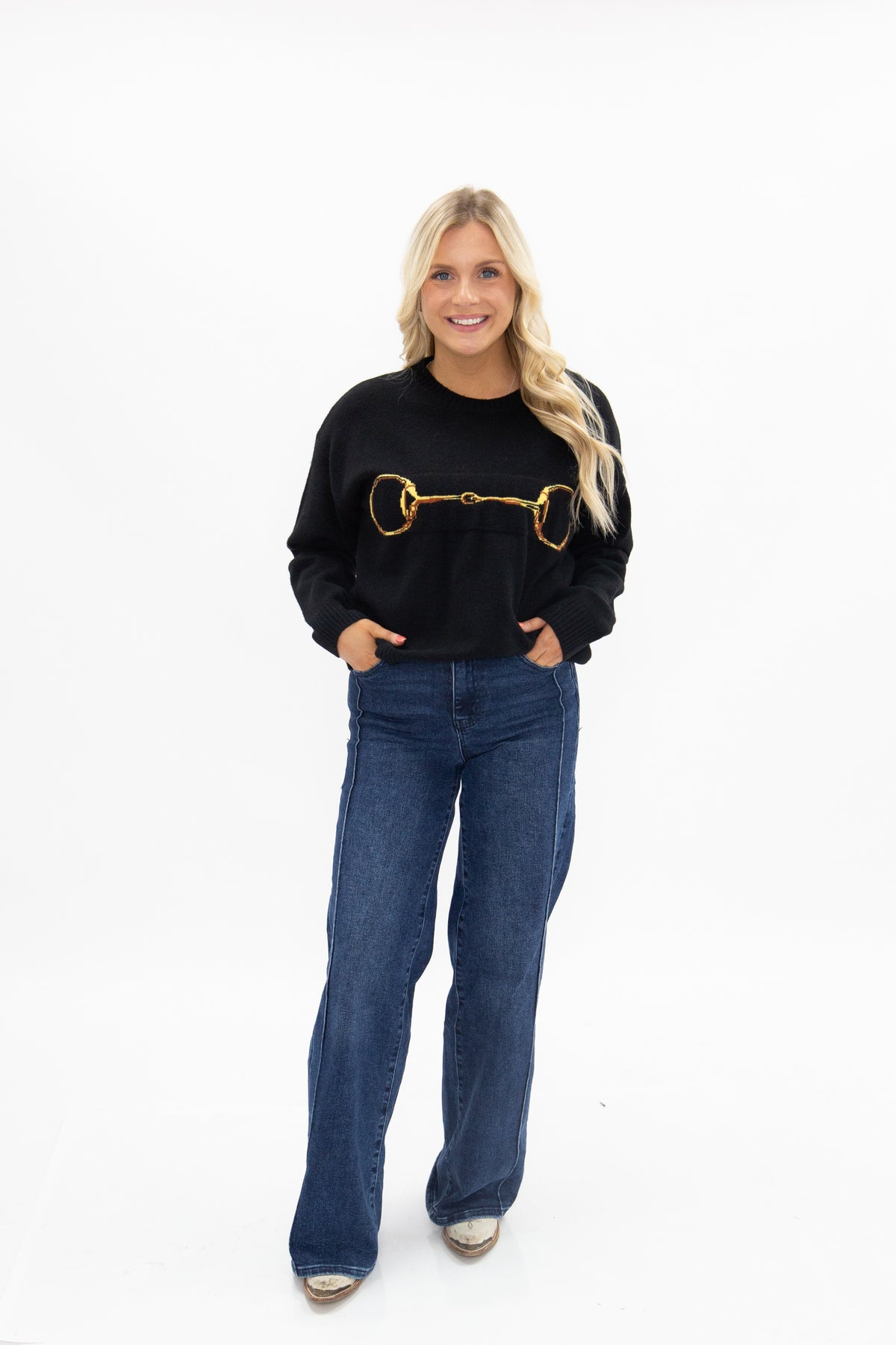 Gold Horse-Bit on a Black Sweater