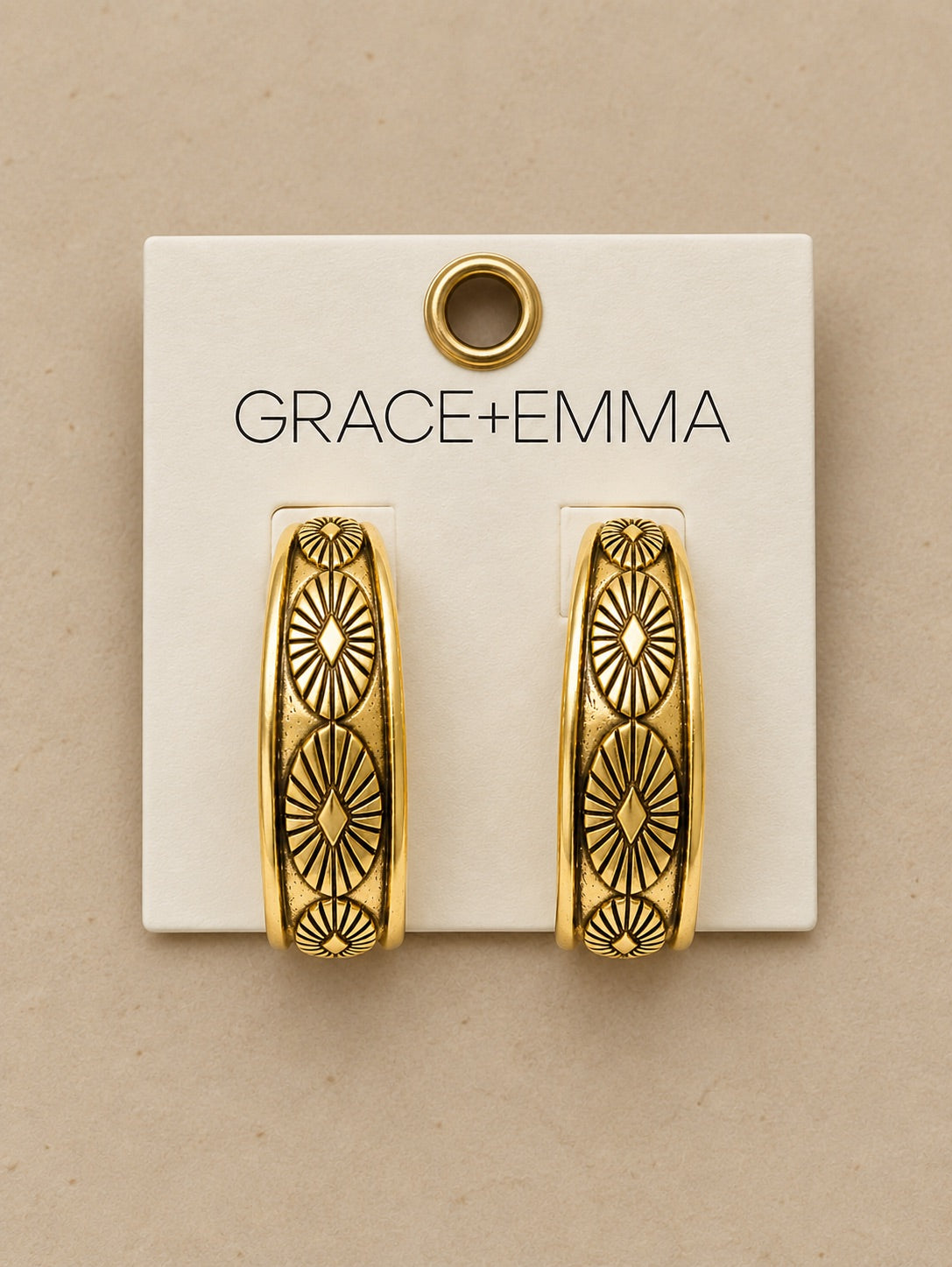 Gold Tooled metal Earrings.