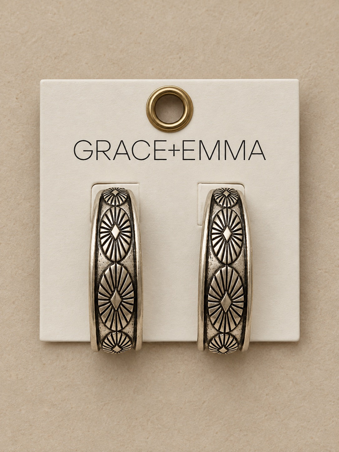 Silver Tooled metal Earrings.