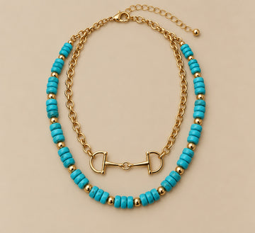 Gold Horse Spit with Turquoise Stone