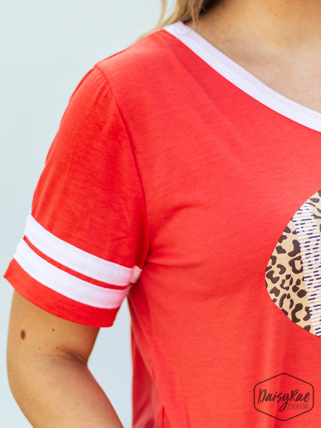 Leopard Print Football on Orange Team Spirit Tee