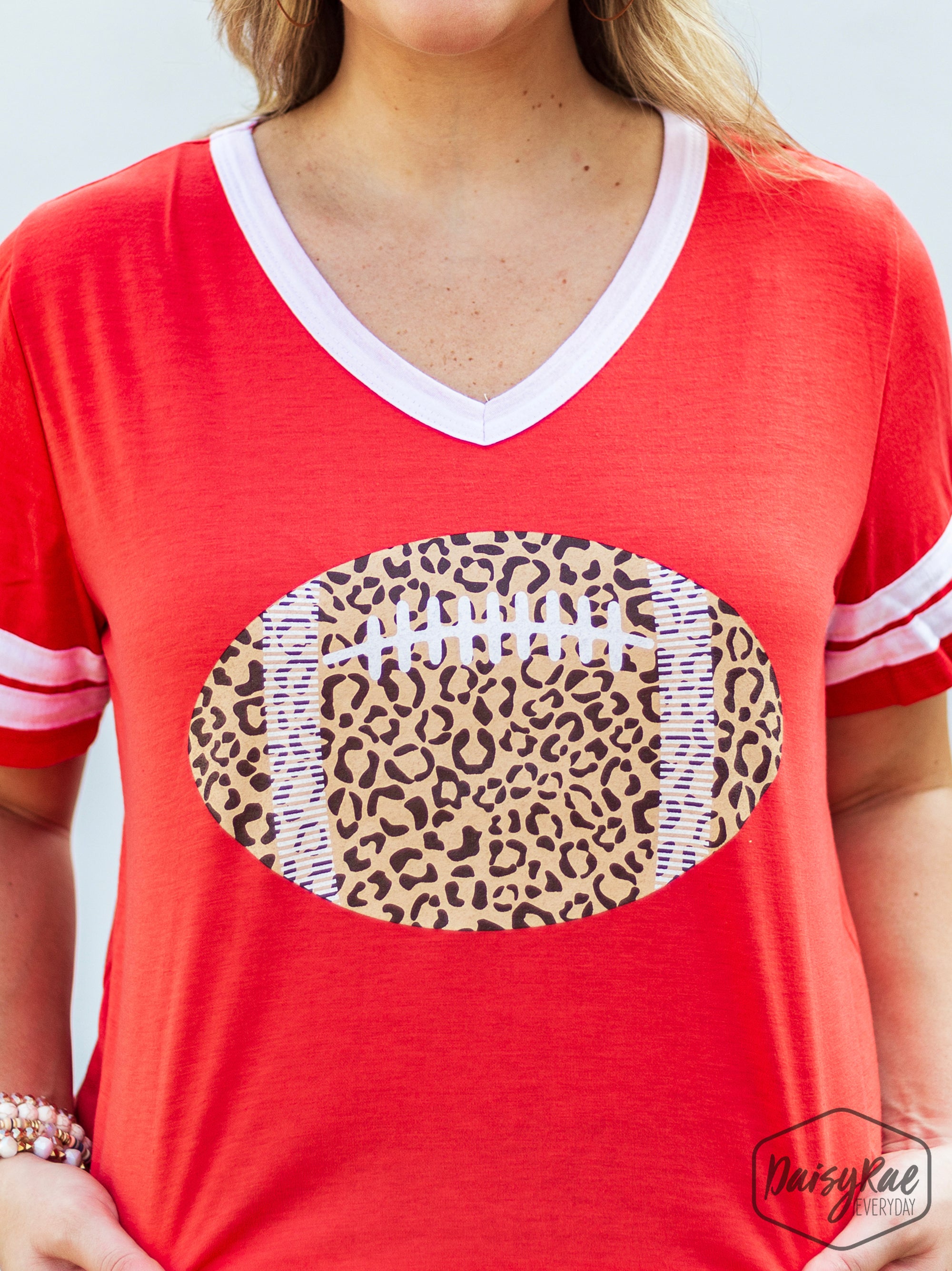 Leopard Print Football on Orange Team Spirit Tee