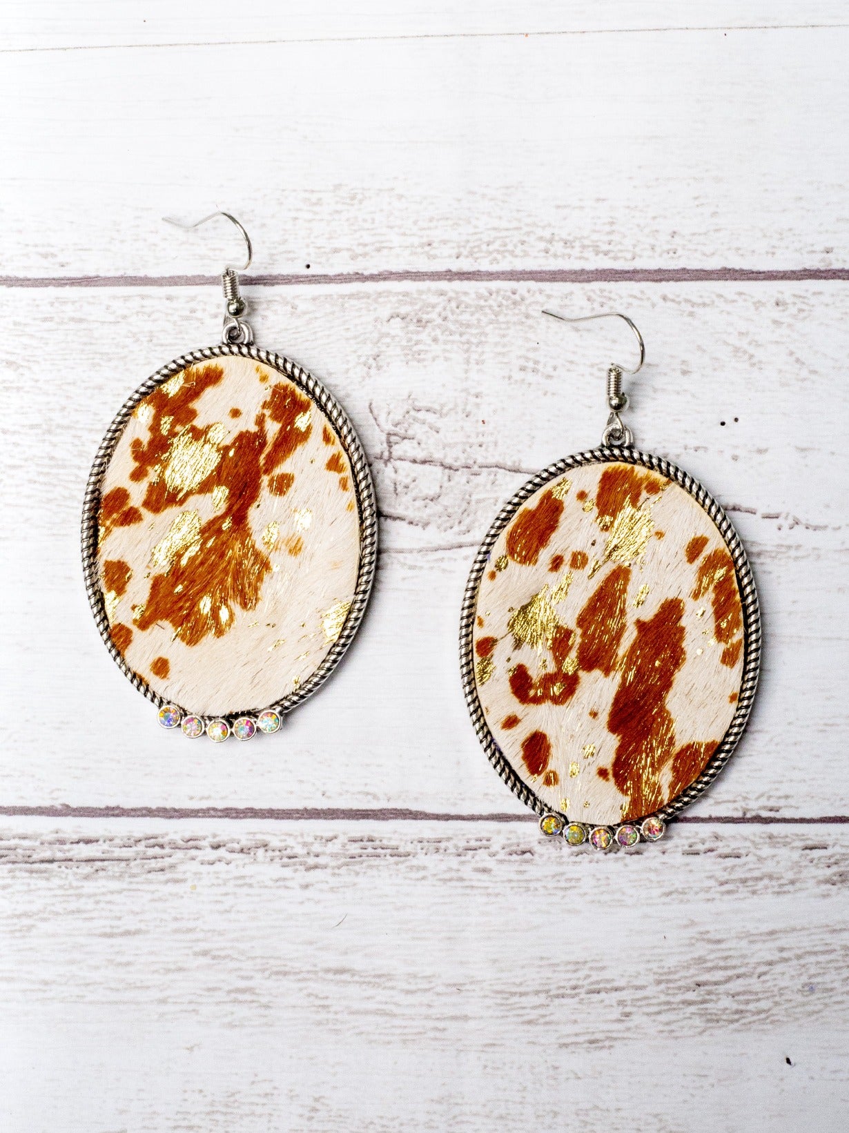 FEELIN' RANCHY LIGHT BROWN WHITE GOLD COWHIDE OVAL SILVER EARRINGS WITH IRIDESCENT CRYSTALS