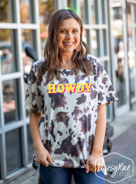 Howdy on Mooving On Short Sleeves T-Shirt, Cow Print