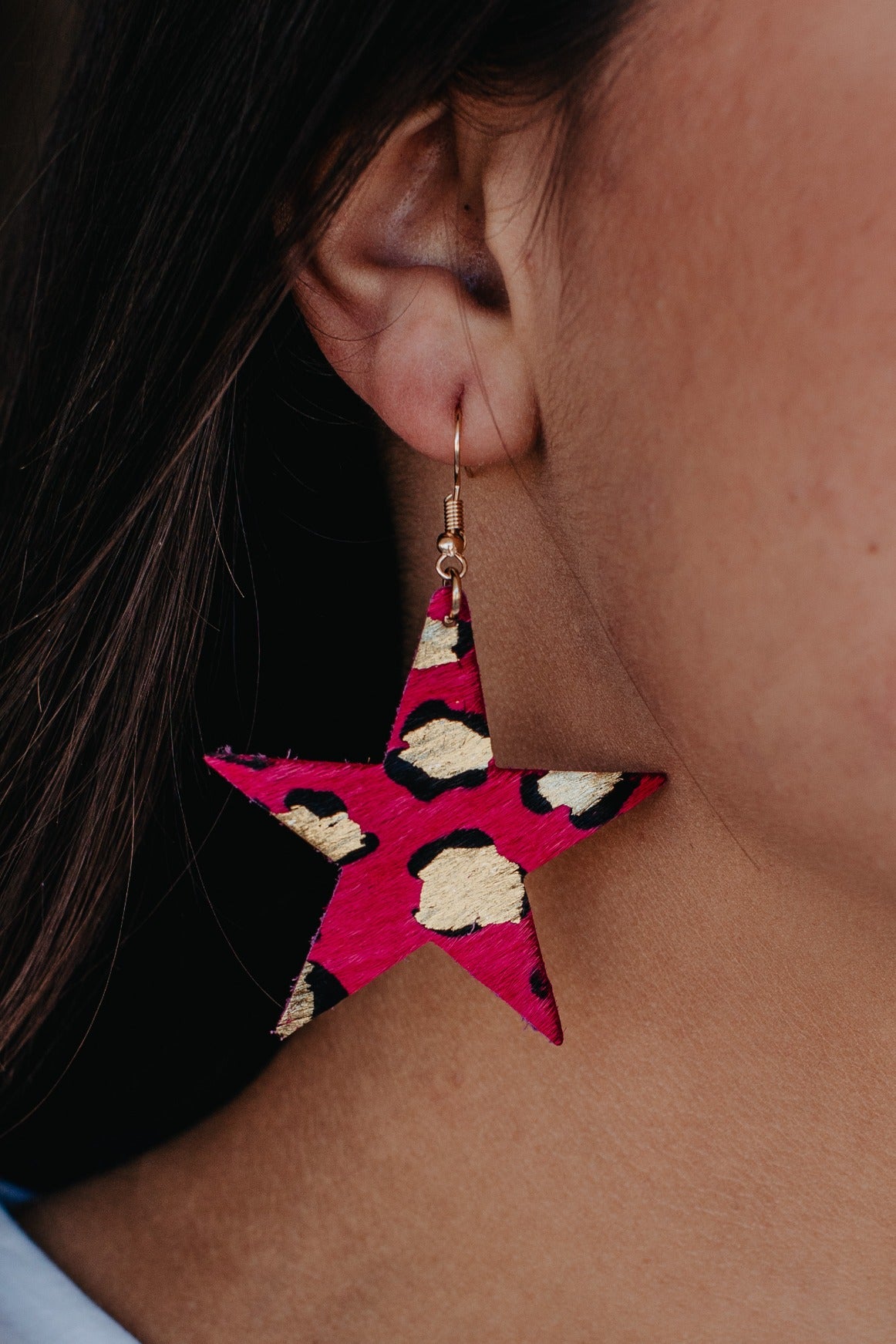 Shine bright, fuchsia star cowhide earring