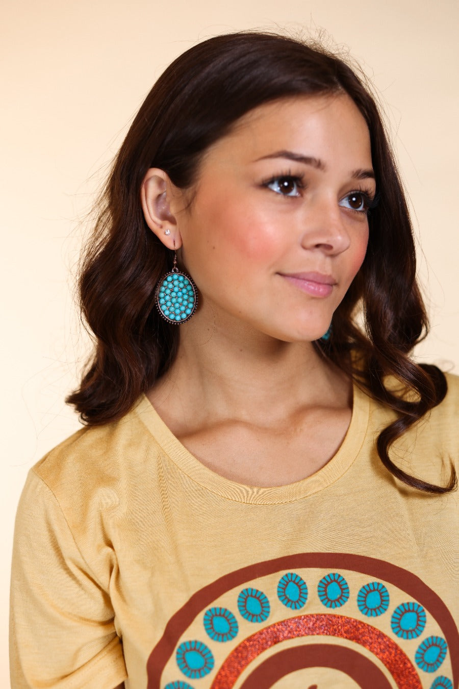 Bumpily Bamboozled Bronze Earrings With A Turquoise Pendant