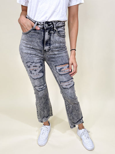 The Blake Stone Wash Mid Rise Distressed Crop Flare